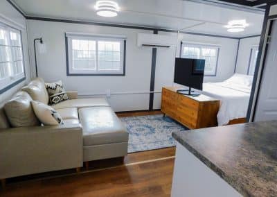 Living room and bedroom combined space in Iron Horse Living rental unit, Odessa TX.